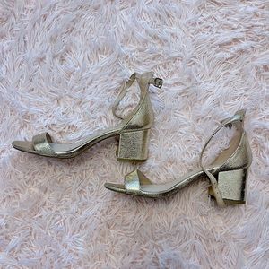 Lulu’s gold heels
